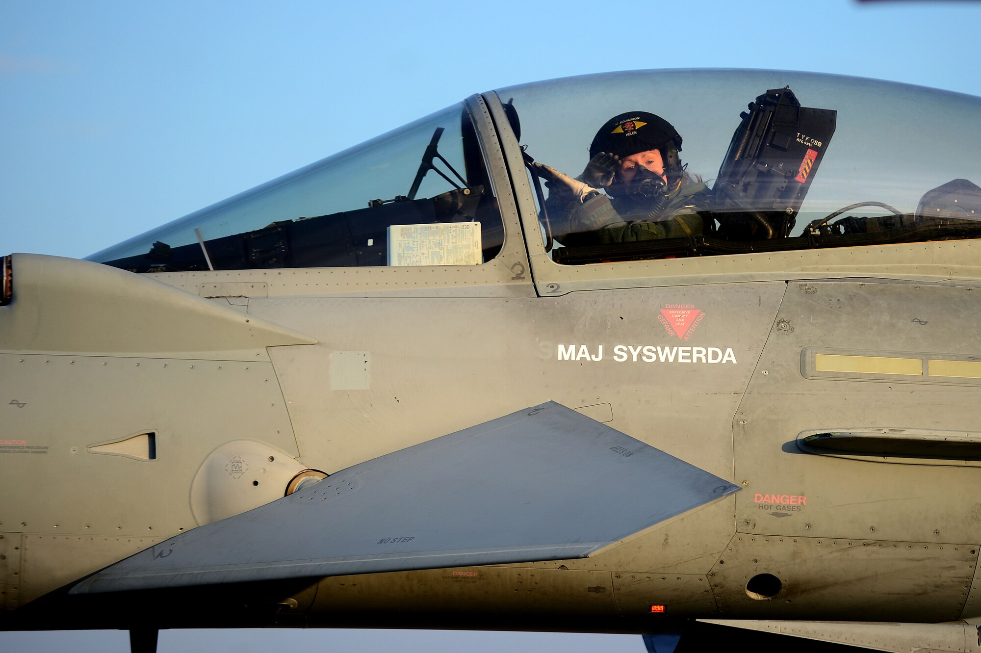 Royal Air Force Flight Lt. Helen Seymour, XI Squadron Typhoon FGR4 pilot, communicates with crew chiefs during pre-flight checks during Exercise Western Zephyr at Langley Air Force Base, Va., Jan. 29, 2013.  In order to enhance the joint capability of the Typhoon FGR4, XI Squadron RAF is training with the F-22 Raptor.  (U.S. Air Force photo by Senior Airman Kayla Newman/Released)