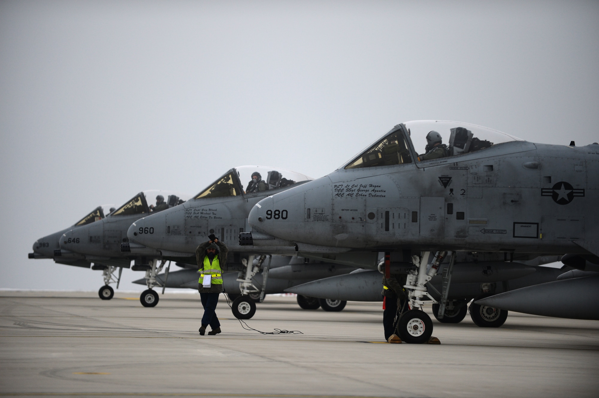 SPANGDAHLEM AIR BASE, Germany – U.S. Air Force Airman 1st Class Fernando Sorto, 52nd Aircraft Maintenance Squadron assistant dedicated crew chief from Plano, Texas, marshals an 81st Fighter Squadron A-10 Thunderbolt II in place on the flightline Jan. 24, 2013. The 81st FS launched multiple aircraft to relocate to Moody Air Force Base to fulfill training requirements and augment the fleet for potential deployments. (U.S. Air Force photo by Airman 1st Class Gustavo Castillo/Released) 