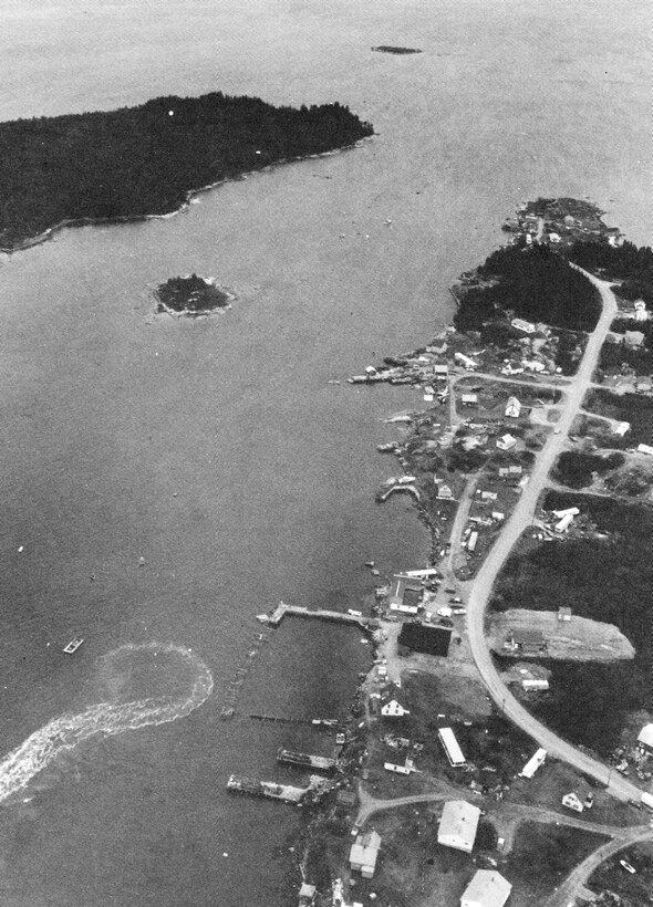 Aerial view of Pig Island Gut. Pig Island Gut in Beals is the narrow passage between Pig Island and Great Wass Island, about one mile southeast of Jonesport and 30 miles east of Bar Harbor. It provides a shorter, less exposed route to the southeastern fishing grounds in Eastern Bay for commercial fishing boats based at Jonesport, Beals Harbor, Alley Bay, ME and in the gut itself. 