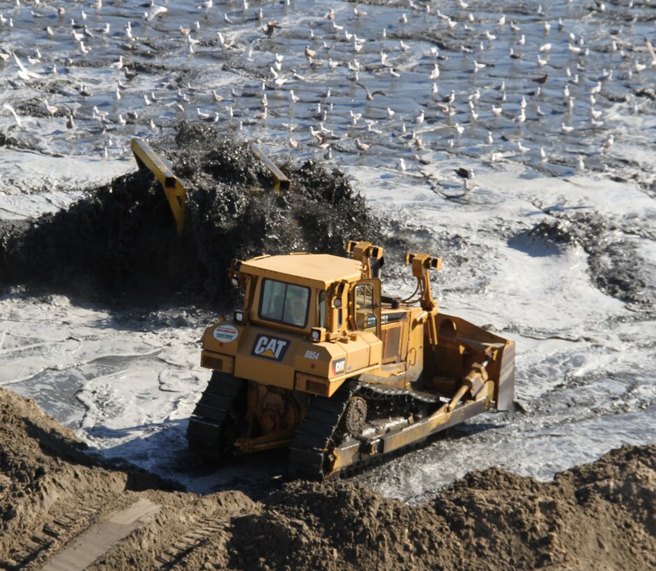 An aerial view of the renourishment area near 25th and 26th Streets at the oceanfront in Virginia Beach, Va. Bulldozers and other equipment on the beach will spread the sand. The $11.9 million beach renourishment project began Sunday, Jan. 6 and will continue until mid-May. This is the first renourishment since the 2001 Virginia Beach Hurricane Protection Beach Renourishment Project was completed. During the renourishment, approximately 1.25 million cubic yards will be placed on the beach between 15th and 70th streets.