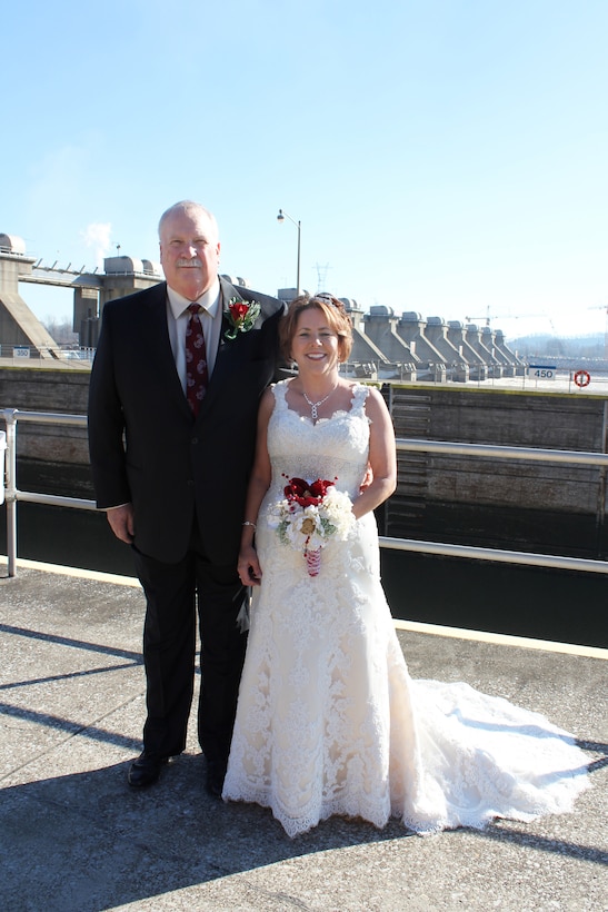 Lock Operator Janet Merritt weds Elvin Barks in a first-of-its-kind ceremony at Cannelton Locks and Dam, Cannelton, Ind., Dec. 12, 2012.