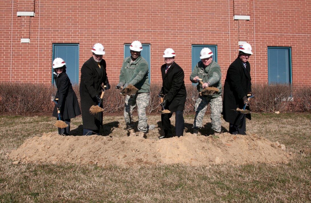 Participants in the DINFOS groundbreaking ceremony included (from left): Dr. Marina Amat, Grimberg/Amatea JV; T.J. Singh, Fort Meade director of public works; Col. Jeremy Martin, Commandant, Defense Information School; Bryan Whitman, Acting Director, Defense Media Activity; Col. Trey Jordan, Commander and District Engineer, U.S. Army Corps of Engineers, Baltimore District; and Peter Grimberg, John C. Grimberg Company.  Photo courtesy Defense Information School.
