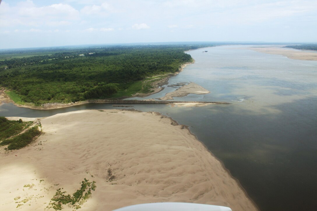 A drought equal to or worse than any in the last 50 years has reduced flows on the Mississippi River, creating sandbars, uncovering the occasional historic treasure and making navigation particularly tricky for barges carrying goods on the nationally critical water highway.