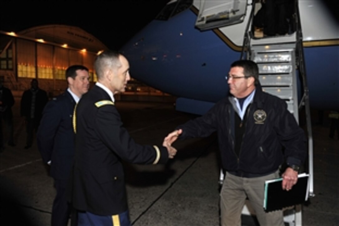 U.S. Army Col. Brendan B. McAloon, the U.S. defense attaché in Paris, welcomes U.S. Deputy Defense Secretary Ashton B. Carter upon his arrival in Paris, Jan. 31, 2013. Carter is on a six-day trip to meet with defense officials and troops in France, Germany and Jordan.
