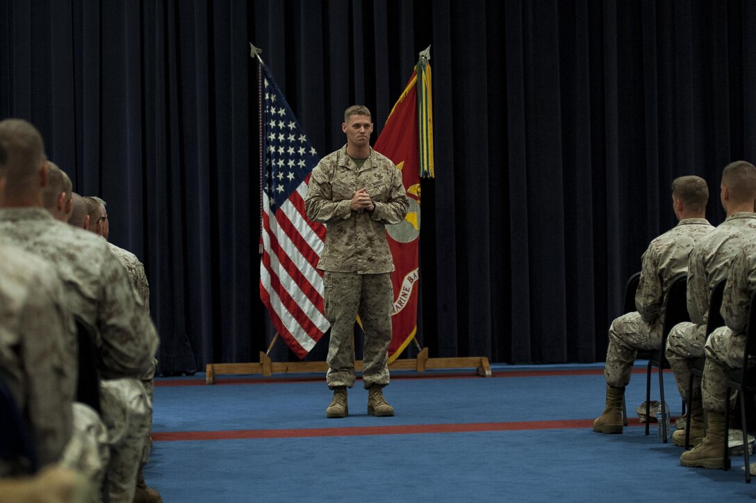 Capt. Tyler Tidwell, incoming Company A commander, speaks during a change of command ceremony at Marine Barracks Washington, D.C., July 1. Tidwell replaced former Co. A commander, Capt. David Bouchard, at the ceremony.