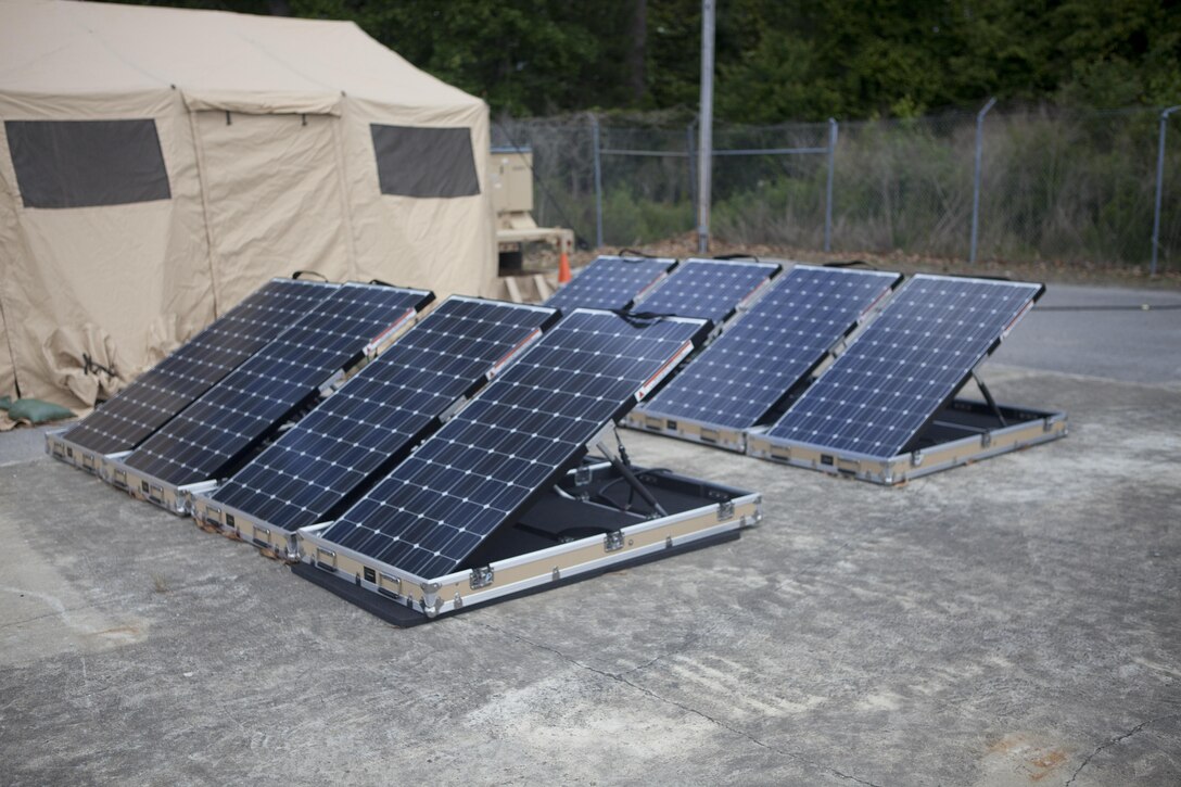 Four solar panels power the inside of the command and control tent used to give the Incidental Radio Operator Course aboard Marine Corps Base Camp Lejeune. The panels were the main source of power for the classroom. (Photo by Pfc. Justin A. Rodriguez/ released)