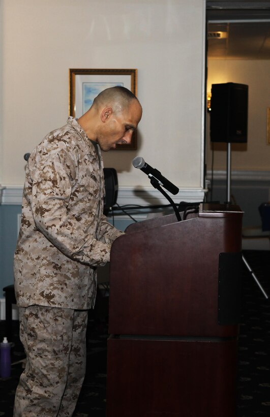 Brig. Gen. Thomas A. Gorry, the commanding general of Marine Corps Installations East-Marine Corps Base Camp Lejeune, shares a prayer with those attending the National Day of Prayer breakfast at the Paradise Point Officer’s Club aboard Marine Corps Base Camp Lejeune May 2. Chaplains of different beliefs and denominations gathered to pray together. (Photo by Pfc. Justin A. Rodriguez/released)