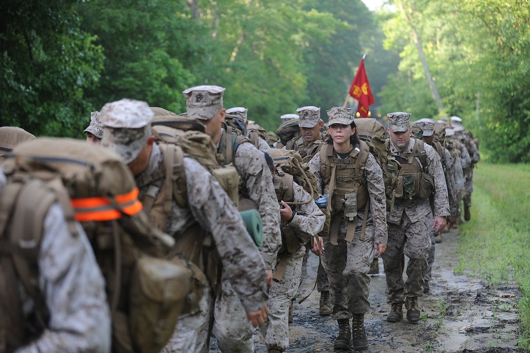 Permanent personnel Marines from The Basic School conduct a 10-mile hike on the west-side of Marine Corps Base Quantico. Two-hundred and thirty-two Marines embarked on the 10-mile hike that lasted three-hours and forty-three minutes.