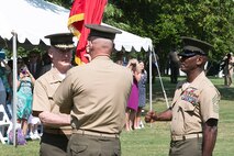 NORFOLK (June 28, 2013) - Lt. Gen. Richard T. Tryon  receives the U.S. Marine Corps Forces Command  organizational colors from Brig. Gen.  W. Blake Crowe, aboard Naval Support Activity Hampton Roads, June 28th, 2013. Lt. Gen Tryon joins MARFORCOM after his assignment as deputy commandant of Plans, Policy and Operations at Headquarters Marine Corps.