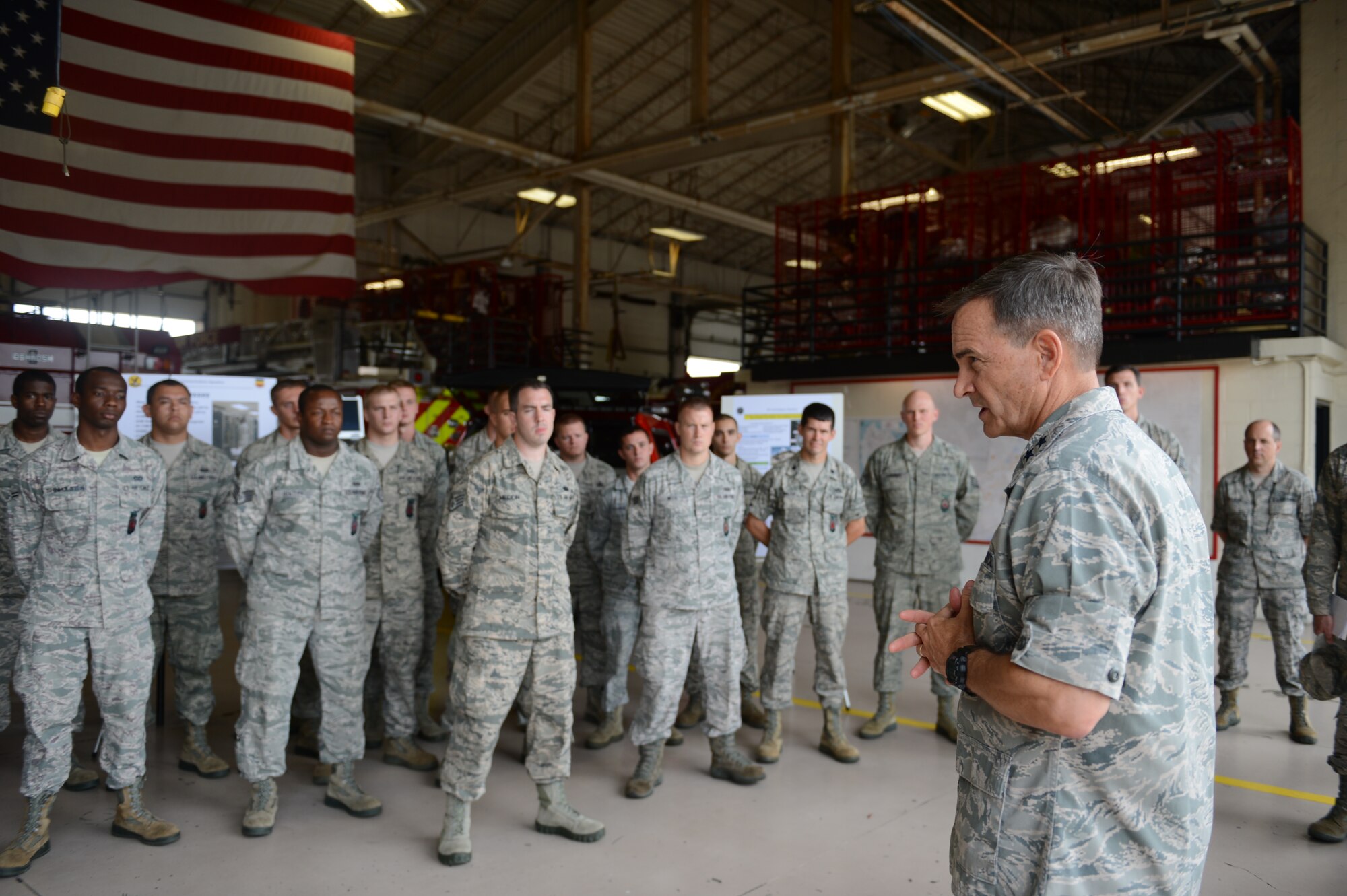 Maj. Gen Jake Polumbo, 9th Air Force commander, speaks to members of 20th Civil Engineer Squadron’s Fire Department about the importance of their job during a tour of 20th Fighter Wing at Shaw Air Force Base, S.C., July 1, 2013. With members of Shaw’s leadership, Polumbo visited various units within 20th FW including 20th Component Maintenance Squadron Propulsion Flight, 20th Medical Group and 20th Maintenance Group. He also toured the McElveen Resource Center and the dorms. (U.S. Air Force photo by Airman 1st Class Krystal M. Jeffers/Released)