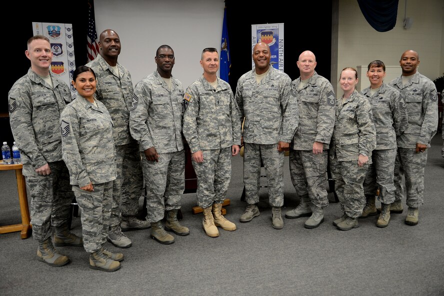 Shaw senior enlisted leaders pose for a group photo with members of the Top Three at a senior enlisted leadership, Shaw Air Force Base, S.C., June 28, 2013. Shaw senior enlisted leaders spoke about what it takes to be in a leadership position, how to become a good leader, certain obstacles you are faced with in those positions and knowing your people. (U.S. Air Force photo by Airman 1st Class Nicole Sikorski/Released)