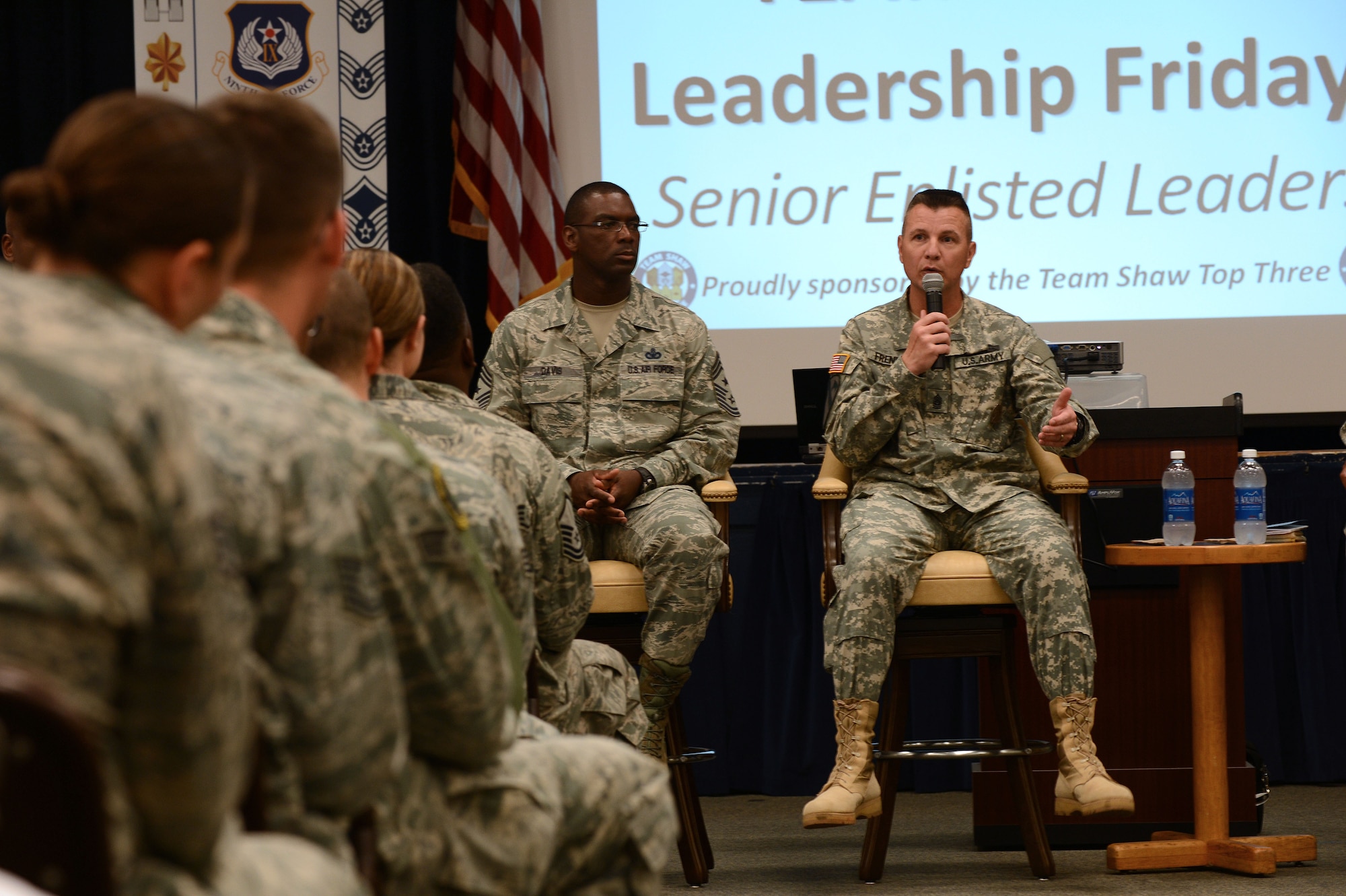 U.S. Army Command Sgt. Maj. Stephan Frennier, Third Army/ARCENT senior enlisted advisor, speaks to service members at the senior enlisted leadership Friday, Shaw Air Force Base, S.C., June 28, 2013.  Frennier, along with five U.S. Air Force chief master sergeants, Chief Master Sgt. Darrel Ford, 20th Operations Group superintendent, Chief Master Sgt. James Davis, 9th Air Force command chief, Chief Master Sgt. James Wilkerson, 20th Fighter Wing command chief, Chief Master Sgt. Suzanne Talbert, 20th Mission Support Group superintendent, and Chief Master Sgt. Robert Rice, 20th Maintenance Operations Squadron superintendent, attended the event.  (U.S. Air Force photo by Airman 1st Class Nicole Sikorski/Released) 