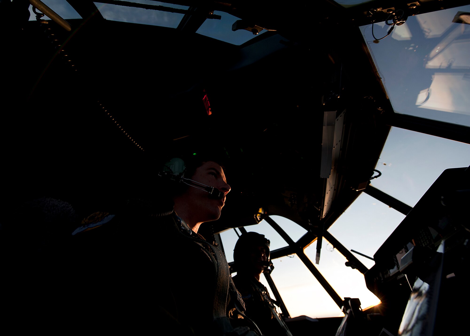 U.S. Air Force Capt. Chris Marron, 39th Airlift Squadron, pilots a C-130J during Joint Operational Access Exercise above North Carolina, June 24, 2013. Dyess Air Force Base, Texas, supported JOAX with 20 C-130Js and 87 aircrew members, which delivered 2,426 paratroopers and more than 140 tons of equipment to multiple drop zones. (U.S. Air Force photo by Airman 1st Class Damon Kasberg/Released)