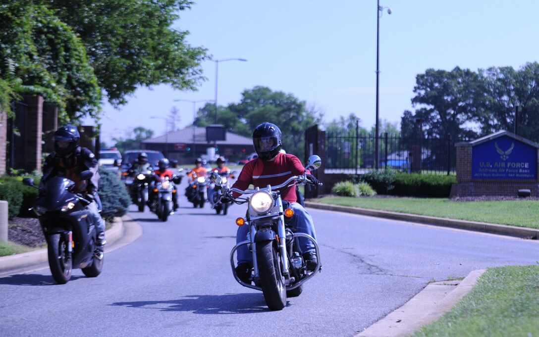 Riders participating in the 3rd Annual Joint Base Andrews Motorcycle Safety Day depart on a group ride June 28, 2013. (U.S. Air Force photo/Jim McKinney)