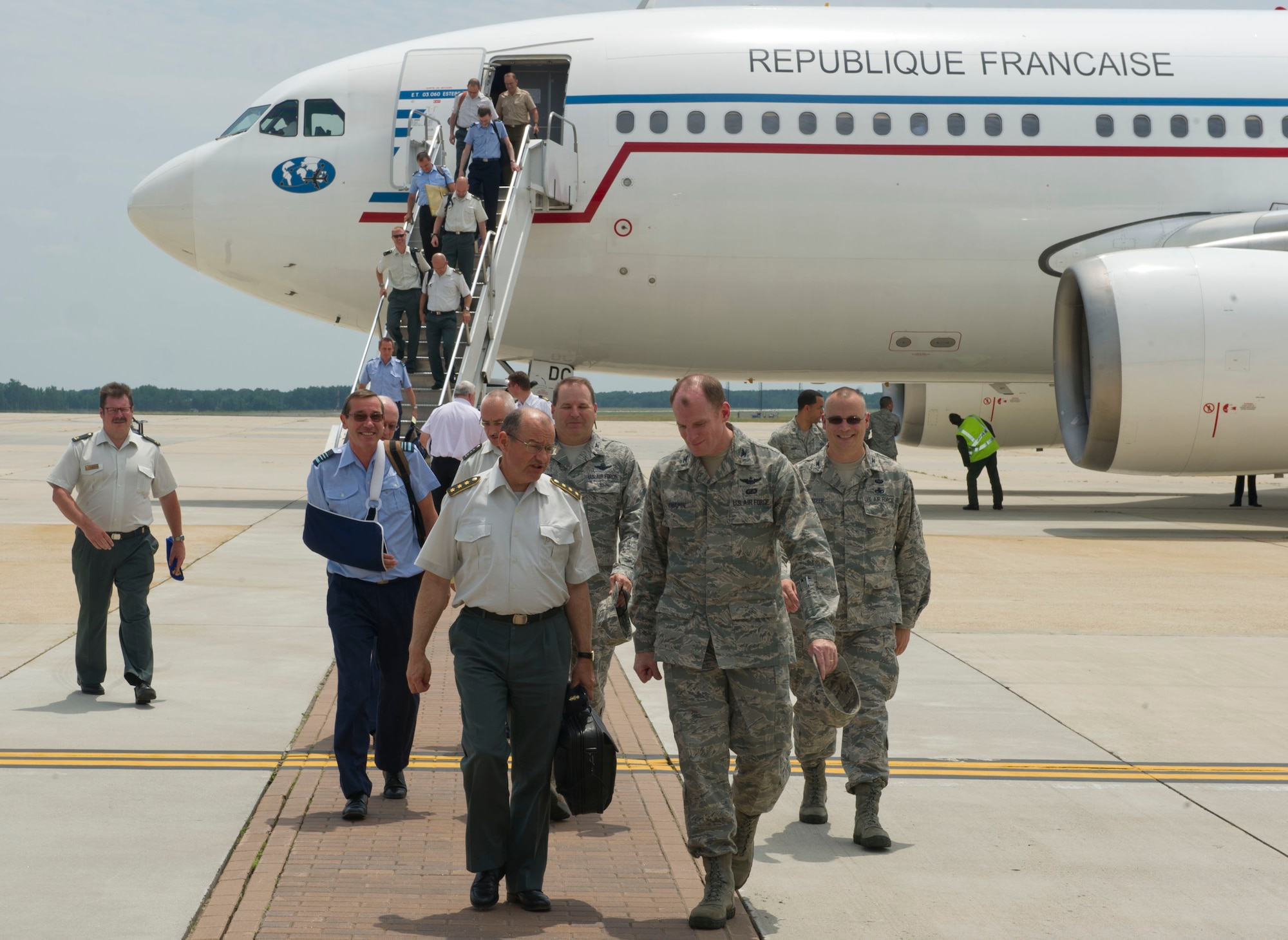 JOINT BASE MCGUIRE-DIX-LAKEHURST, N.J. -- Colonel Marty Chapin, 621st Contingency Response Wing commander, meets with Lt. Gen. Francois Hendrickx, Belgian director of military education, on the Joint Base McGuire-Dix-Lakehurst flightline, June 26, 2013. The general, along with 34 military students from various nations, toured the CRW as part of their Advanced Staff Course at the Royal Military Academy in Brussels, Belgium. (U.S. Air Force photo by Staff Sgt. Gustavo Gonzalez)