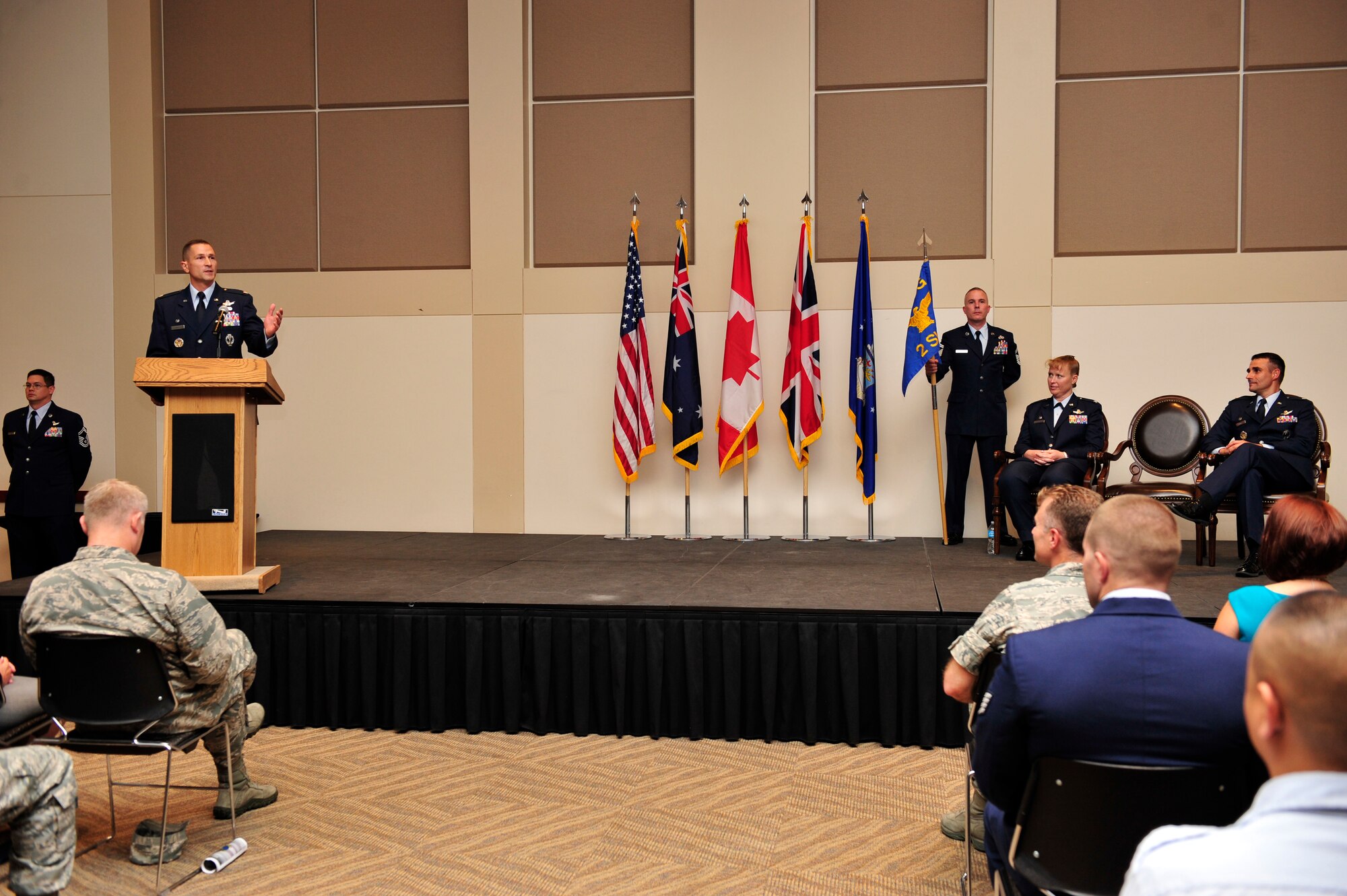 Lt. Col. Francois Roy, 2nd Space Warning Squadron commander, speaks to an audience about how honored he is to take command June 19, 2013, at the Leadership Development Center on Buckley Air Force Base, Colo. Roy arrived from the 11th Space Warning Squadron, Schriever AFB, Colo. (U.S. Air Force photo by Airman 1st Class Darryl Bolden Jr./Released)