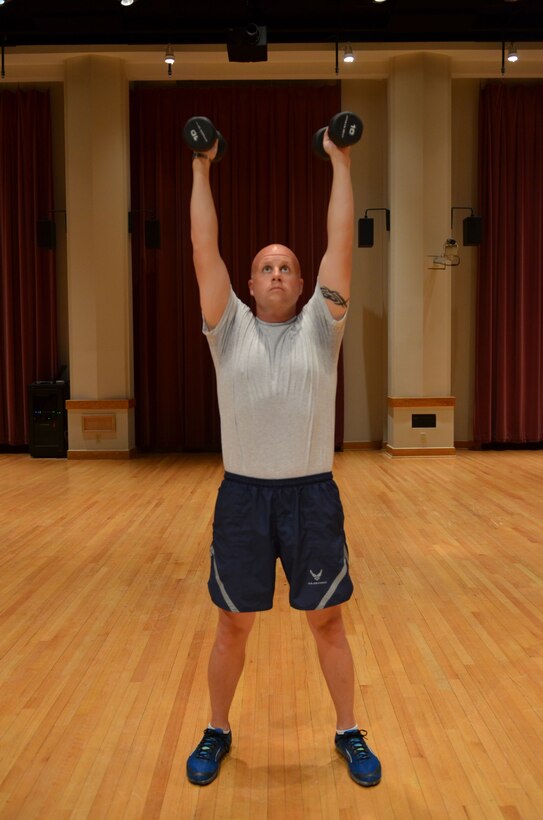 Master Sergeant Carson demonstrates the "Press Up" end  position.  (A.F. Photo)
