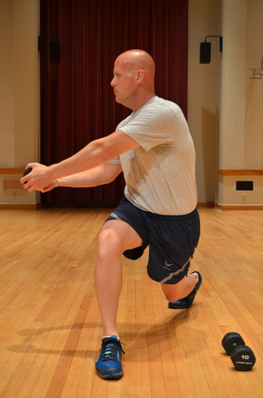 Master Sergeant Casron demonstrates the "Twist Lunge" mid position. (A.F. Photo)