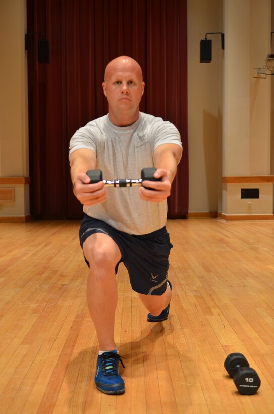 Master Sergeant Carson demonstrates the "Twist Lunge" start position. (A.F. Photo)