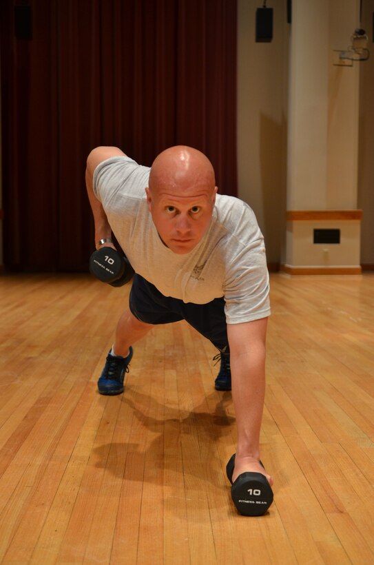 Master Sergeant Carson demonstrates the "T-row" right position. (A.F. Poto)