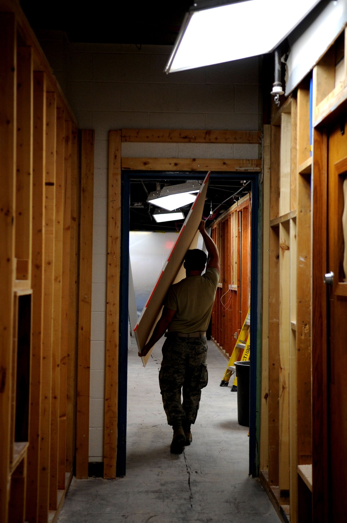 Airmen from the 319th Civil Engineer Squadron are renovating a portion of Building 408 on Grand Forks Air Force Base, N.D., as part of a Contingency Construction Home Station Training (CCHST) project, which serves as in-house training to hone engineers’ skills in their respective vocations, as well as improve quality of life for building occupants. Engineers of many specialties, including structural and power production engineers, electricians, Heating, Ventilation Air Conditioning (HVAC) and Refrigeration specialists, have come together to complete project. (U.S. Air Force photo/Staff Sgt. Amanda Grabiec)
