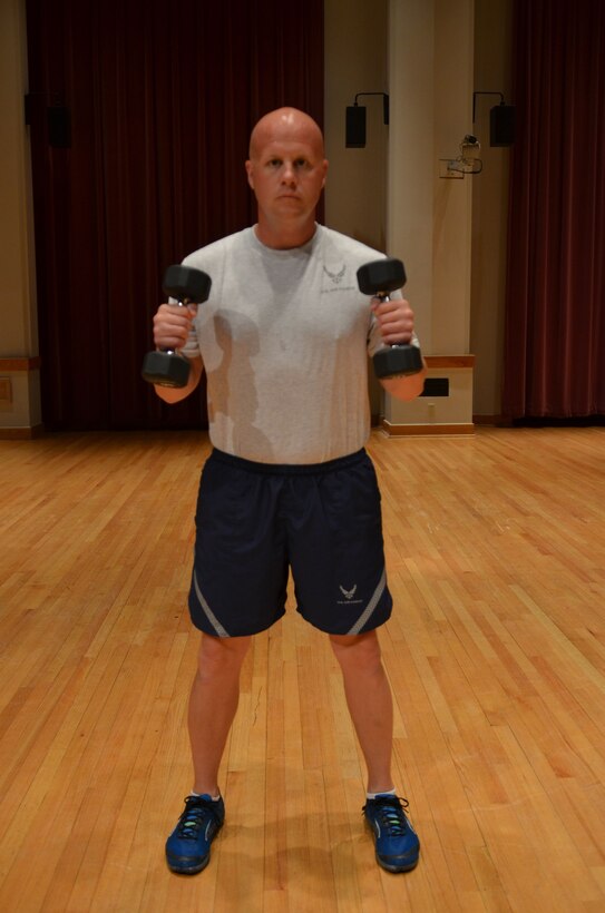 Master Sergeant Carson demonstrates the "Curl" end position. (A.F. Photo)
