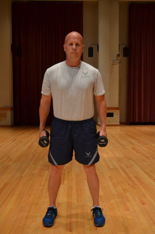 Master Sergeant deomonstrates the "Curl" start position. (A.F. Photo)