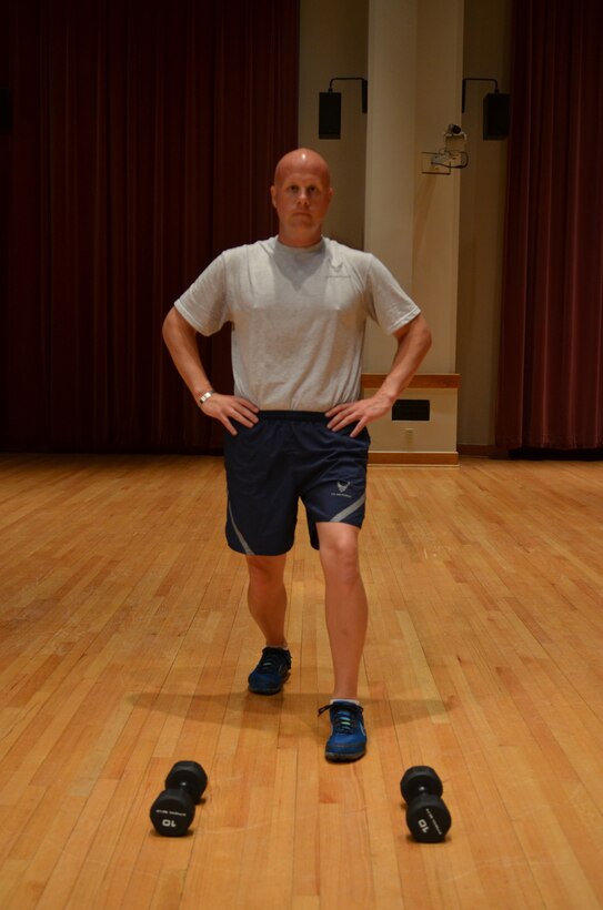 Master Sergeant Carson demonstrates the "Split Jump" left position. (A.F. Photo)