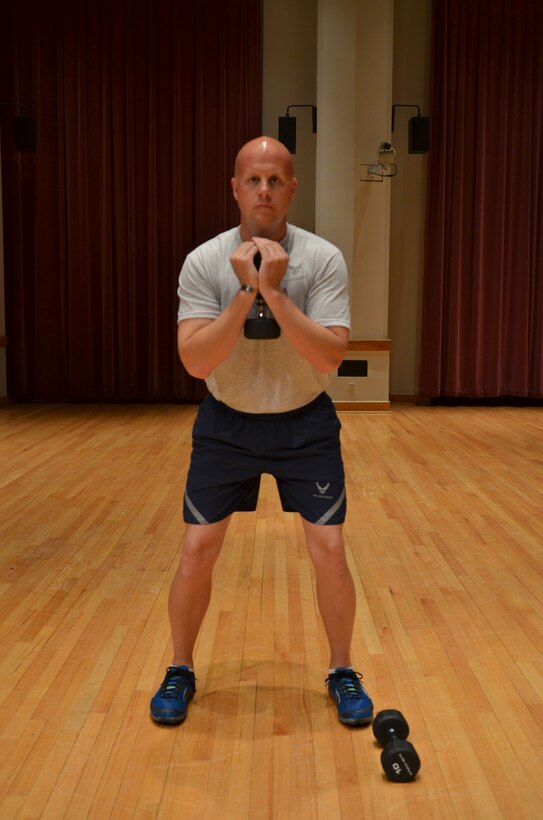 Master Sergeant Carson demonstrates the "Goblet Squat" end position.