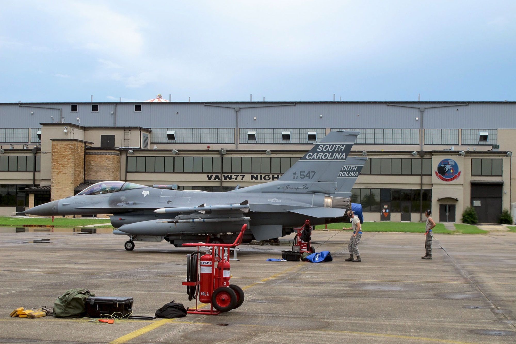 U.S. Air Force Airmen with the South Carolina Air National Guard from McEntire Joint National Guard Base, S.C., conduct flight line activities during an F-16 Fighting Falcon training mission at the Naval Air Station Joint Reserve Base New Orleans, La., June 20, 2013.   (U.S. Air National Guard photo by 157th Fighter Squadron Unit Public Affairs Representative/Released)