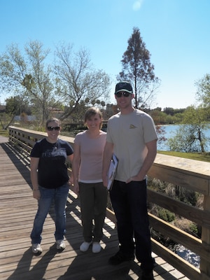 The members of EMC Magnitude Design, Inc. at Booker Creek, the site of their award-winning water environment improvement design. Pictured left to right is Miki Skinner, Caitlin Hoch and Brett French. Team members not pictured are Erin Morrison and Josh Becker. 