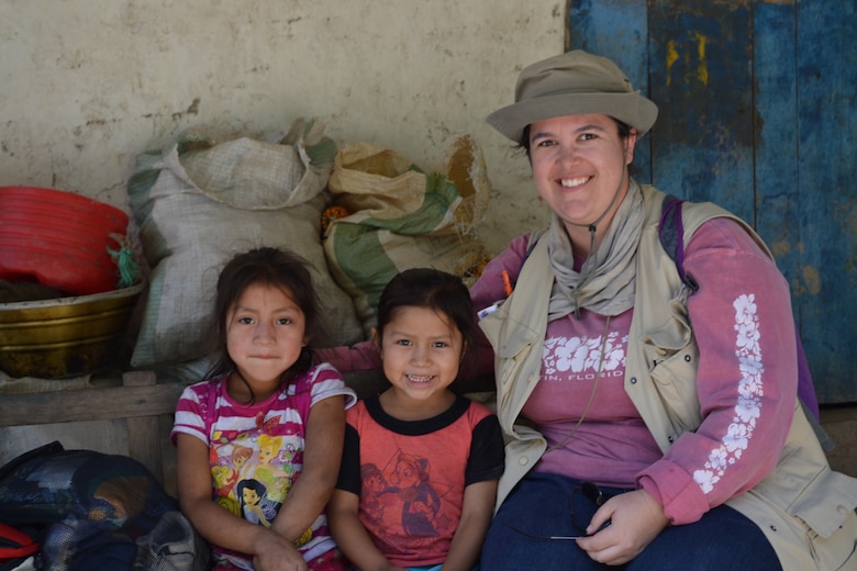 Engineers Without Borders traveled to the community of Las Vegas in the Nahuaterique region of Honduras in May 2013, to gain water rights from landowners and establish community relations.  Crystal Markley (right) is pictured with (l to r) Santos Cristobal (Treasurer of the Las Vegas Water Board) and his daughter , EWB-USA team member Rich Roberts and an unknown community team member.  