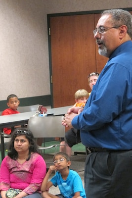 Tony Torres, chief of the Systems-Cost Division at the U.S. Army Engineering and Support Center, Huntsville, spoeaks at a Discover Tech mentoring session in the Madison Public Library media room June 6. 