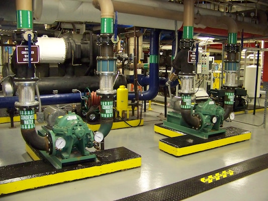 An example of pumps found in a mechanical room in a hospital. The OMEE program maintains the facility and performs preventative maintenance and repairs to these type pumps as well as other mechanical systems.