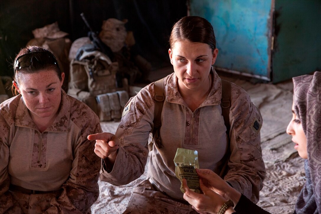 U.S. Navy Hospitalman 3rd Class Kristin Gigstad, 26th Marine Expeditionary Unit (MEU), participates in female engagement team training with Jordanian Armed Forces soldiers during Exercise Eager Lion 2013 in Al Quweira, Jordan, June 14, 2013. Exercise Eager Lion 2013 is an annual multinational exercise designed to strengthen military-to-military relationships and enhance security and stability in the region by responding to modern-day security scenarios. The 26th MEU is a Marine Air-Ground Task Force forward-deployed to the U.S. 5th Fleet area of responsibility aboard the Kearsarge Amphibious Ready Group serving as a sea-based, expeditionary crisis response force capable of conducting amphibious operations across the full range of military operations. (U.S. Marine Corps photo by Staff Sgt. Edward Guevara/Released)