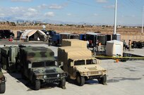 Members of the 92nd Civil Support Team set up an operation site in less than an hour during the 92nd CST’s evaluation exercise Feb. 10 at the National Guard Readiness Center in Las Vegas. The site included a mobile operations center, mobile laboratory and decontamination site.
