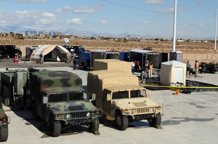 Members of the 92nd Civil Support Team set up an operation site in less than an hour during the 92nd CST’s evaluation exercise Feb. 10 at the National Guard Readiness Center in Las Vegas. The site included a mobile operations center, mobile laboratory and decontamination site.
