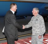 William Lynn, Deputy Secretary of Defense, is greeted by Air Force Maj. Gen. John Bordelon, North American Aerospace Defense Command and U.S. Northern Command chief of staff, as he arrives at the Peterson AFB flightline April 13. Mr. Lynn will meet with Air Force Gen. Gene Renuart, NORAD and USNORTHCOM commander, to learn more about the commands and their missions.
