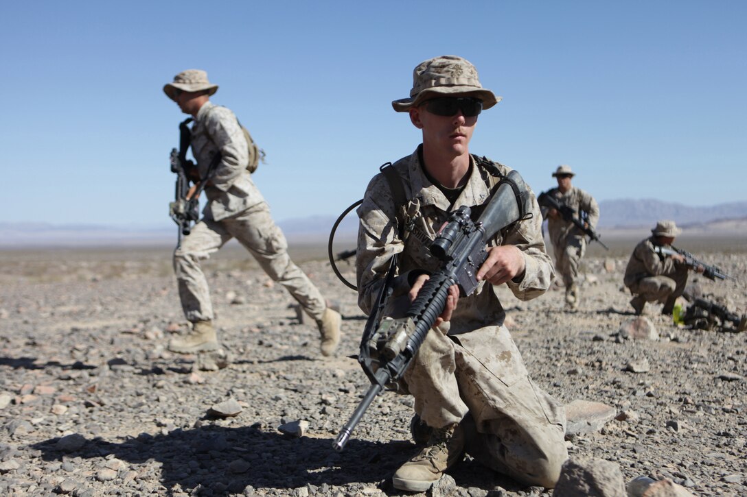 TWENTYNINE PALMS, Calif. – Lance Cpl. Andrew Shivley, a rifleman with Company B, 1st Battalion, 24th Marine Regiment, and a native of Kokomo, Ind., provides security during a rehearsal at Marine Corps Air-Ground Combat Center here, June 17. Range 410A is part of Integrated Training Exercise 4-13, a cornerstone of the Marine Air-Ground Task Force Training Program and the largest annual U.S. Marine Corps Reserve training exercise. (U.S. Marine Corps photo by Cpl. John M. McCall)