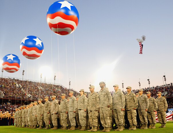 Airmen stand in formation during the halftime show of the San Jose Earthquakes versus Los Angeles Galaxy soccer game at Stanford University Stadium in Palo Alto, Calif., June 29, 2013. More than 50,000 fans attended the game to honor the men and women of the armed forces. (U.S. Air Force photo by Airman 1st Class Bobby Cummings)