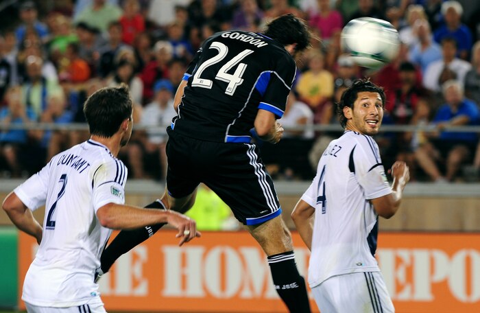 Alan Gordon of the San Jose Earthquakes heads in the Earthquakes first goal in the 68th minute of their MLS game against the Los Angeles Galaxy at Stanford University Stadium on June 29, 2013.The Earthquakes won the game 3-2. (U.S. Air Force photo by Airman 1st Class Bobby Cummings)