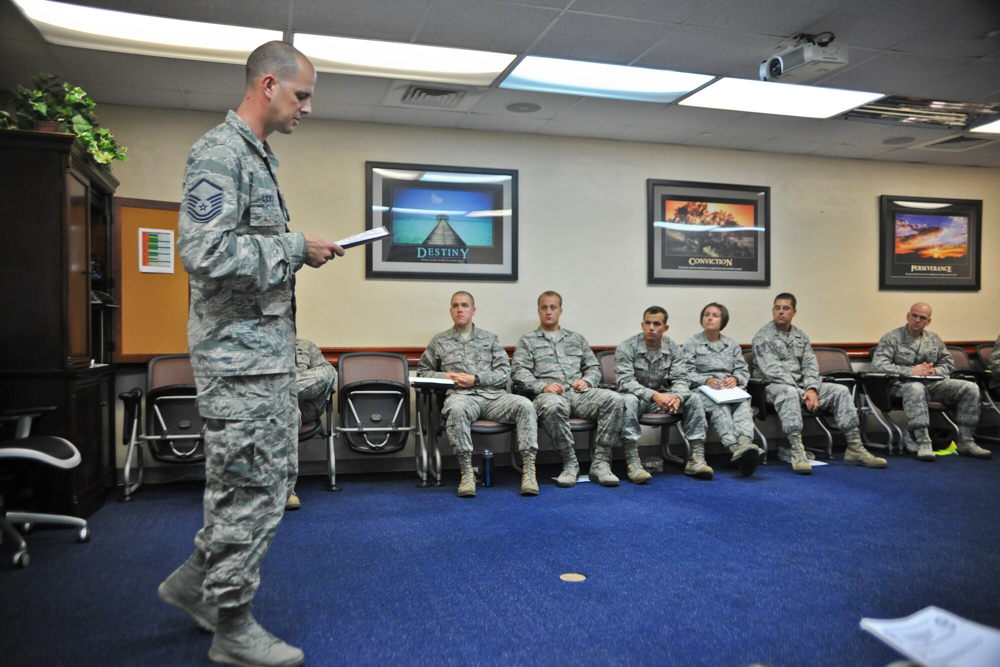Master Sgt. Bobby Lynch, member of the 734th Air Mobility Squadron and Operation Christmas Drop president, briefs members of the Air Force Sergeants Association Chapter 1560 on the importance and awareness of OCD June 26, 2013, on Andersen Air Force Base, Guam. Throughout the year, members of the AFSA chapter here volunteer and hold fundraisers to help sponsor base-wide morale events. There are currently 385 members in Andersen’s local chapter. (U.S. Air Force photo by Senior Airman Robert Hicks/Released)