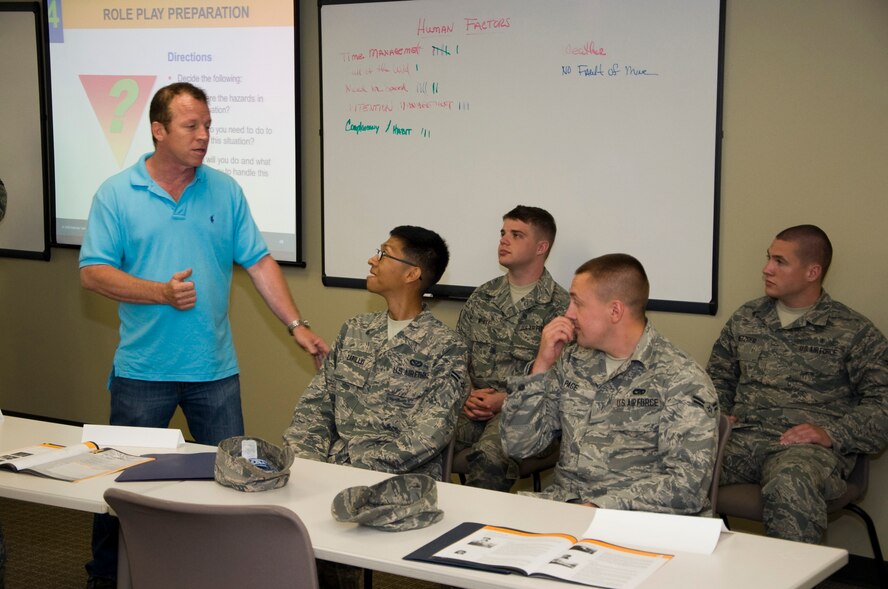 Tim Hahn, 436th Airlift Wing Safety Office occupational safety and health specialist, explains the roles Airmen will be acting out in a scenario during “Alive at 25” defensive driving course June 26, 2013, Dover Air Force Base, Del. “Alive at 25” was initially brought to Dover AFB in 2007 to help combat the high amount of Airmen involved in alcohol-related driving offenses, and has helped reduce the number of offense by 33 percent over the past five years .(U.S. Air Force photo/Senior Airman Jared Duhon)