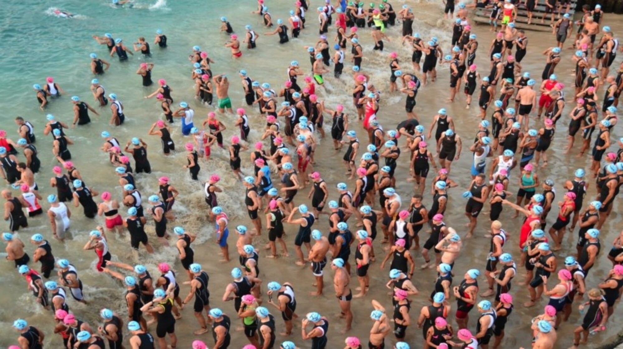 A crowd of swimmers wait for a race to start during the 2013 Armed Forces National Championships at Naval Base Ventura County, Calif., June 1, 2013. Morrison finished the race in first place with a time of 2:07.39. (Courtesy photo)