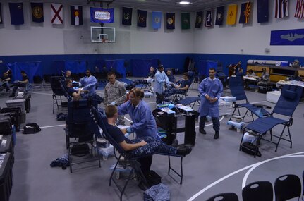 Students at the Naval Nuclear Power Training Command participate in an Armed Services Blood Program blood drive June 25, 2013, at NNPTC on Joint Base Charleston – Weapons Station, S.C. The ASBP plays a vital role in providing quality blood products for servicemembers and their families. (U.S. Navy photo/Petty Officer 3rd ClassJason Pastrick)