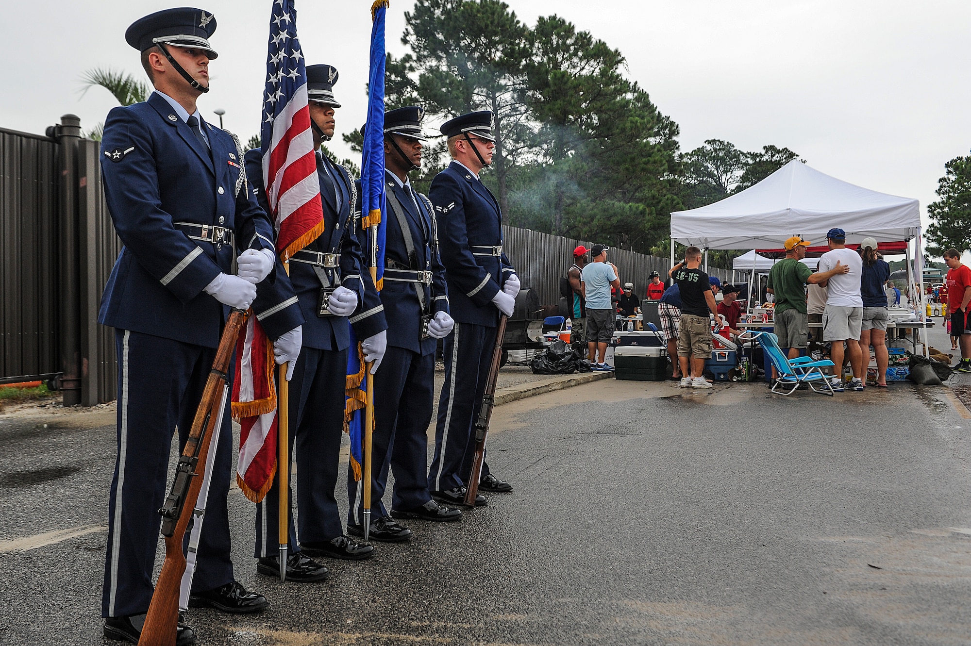The Hurlburt Field’s honor guard stands at attention before presenting the colors at the 18th Annual Sound of Independence celebration at the Soundside Marina on Hurlburt Field, Fla., June 28, 2013.  The celebration had various booths set up to provide food, fun and explain all the new services Hurlburt Field has established in the last year. (U.S. Air Force photo/Airman 1st Class Christopher Callaway)