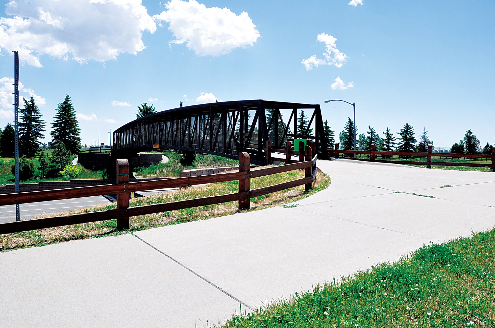 A bridge over Converse Avenue allows people walking or biking along the Greenway of Cheyenne, Wyo., safe passage across a busy street. (U.S. Air Force photo by Senior Airman Dan Gage)