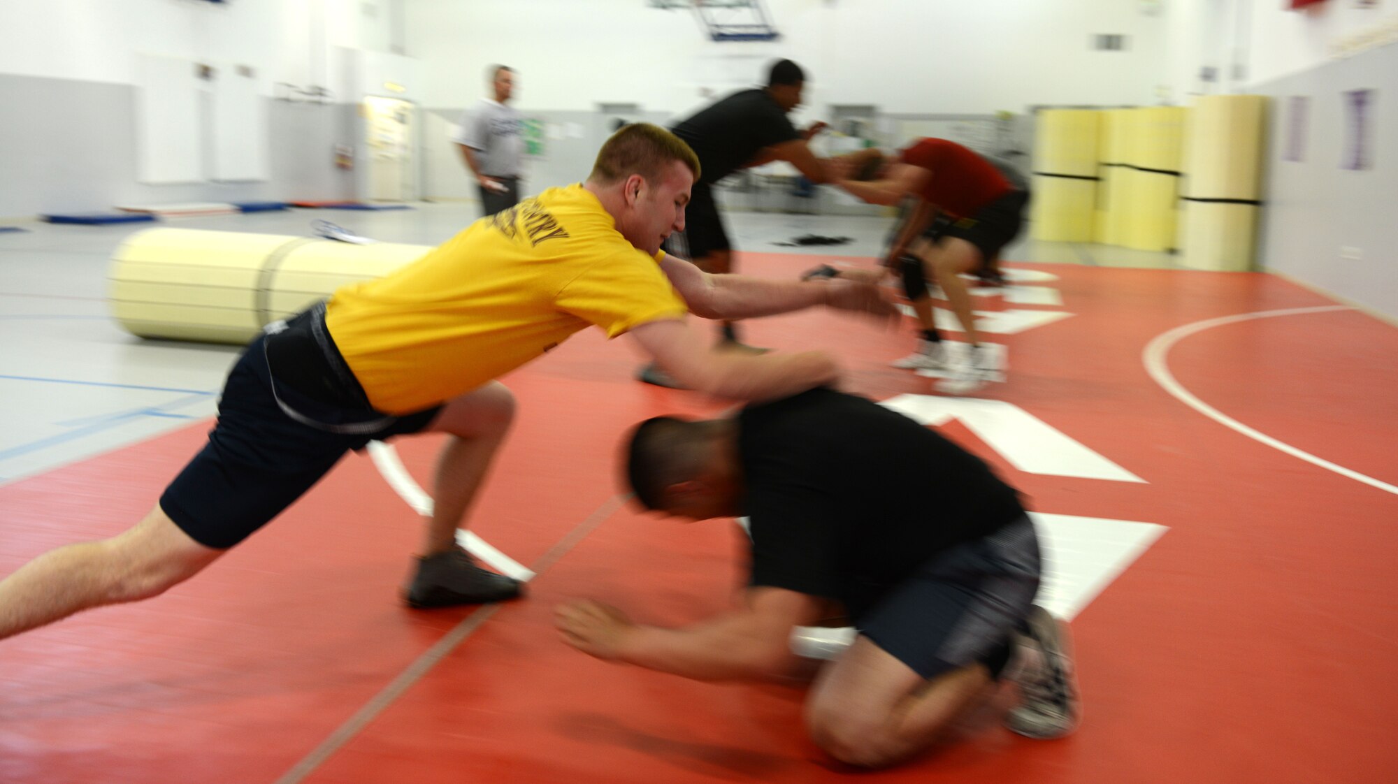 Alexander Worm and Julian Chairez, grapple June 5, 2013, at Aviano Air Base, Italy. Wrestling is one of the oldest forms of combat, dating back more than 15,000 years. (U.S. Air Force photo/Airman Ryan Conroy) 