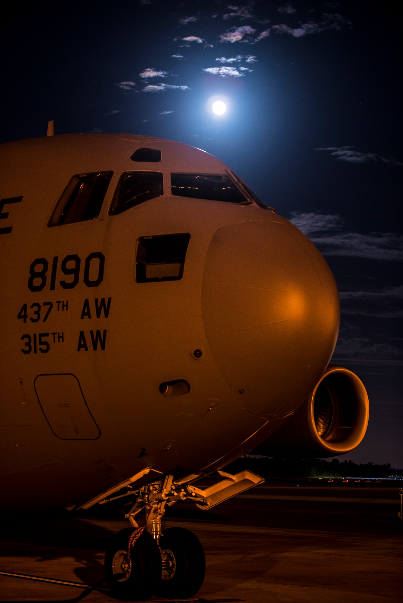 A full moon rises over a C-17 Globemaster III June 22, 2013, at Joint Base Charleston –Air Base, S.C. The full moon that occurred June 22 was considered a supermoon 10 percent visibly larger than any other full moon during the year. (U.S. Air Force photo/ Senior Airman Dennis Sloan)