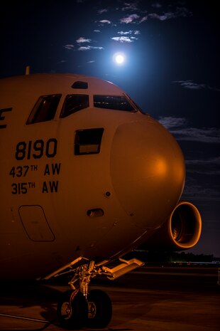 A full moon rises over a C-17 Globemaster III June 22, 2013, at Joint Base Charleston –Air Base, S.C. The full moon that occurred June 22 was considered a supermoon 10 percent visibly larger than any other full moon during the year. (U.S. Air Force photo/ Senior Airman Dennis Sloan)